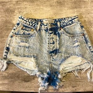 High rise light washed jean shorts.